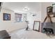 Finished basement with natural light, exercise equipment, and ample space for a home gym or recreational area at 250 W Midway Blvd, Broomfield, CO 80020