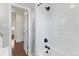 Bathroom featuring a tub, modern fixtures and tiled shower at 250 W Midway Blvd, Broomfield, CO 80020