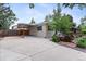 Charming single story home with a covered carport, mature trees, and well-maintained landscaping at 250 W Midway Blvd, Broomfield, CO 80020