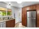 Bright kitchen featuring stainless steel appliances and granite countertops at 250 W Midway Blvd, Broomfield, CO 80020