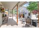 Spacious outdoor patio with comfortable seating, string lights, and a charming ambiance for relaxing and entertaining at 250 W Midway Blvd, Broomfield, CO 80020