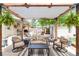 Relaxing covered patio seating area with outdoor furniture and stylish decor for enjoying the outdoors at 250 W Midway Blvd, Broomfield, CO 80020