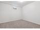 Basement with carpet flooring and natural light from a window, perfect as a bedroom at 6508 S Garland Way, Littleton, CO 80123
