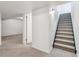 Finished basement with carpet, also features stairs up to the first floor at 6508 S Garland Way, Littleton, CO 80123
