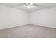 Bedroom with carpet and ceiling fan, perfect as a guest room or home office at 6508 S Garland Way, Littleton, CO 80123