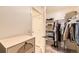 Walk-in closet complete with shelving, drawers, and hanging racks, offering ample storage space at 1005 Ryland Rd, Brighton, CO 80603