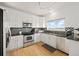 Kitchen features stainless steel appliances, granite countertops, and mosaic tile backsplash at 11980 Swansea Dr, Parker, CO 80134