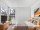 Comfortable bedroom with natural light, plush bedding, and stylish decor at 6852 S Dover Way, Littleton, CO 80128