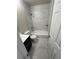 Modern bathroom featuring marble tile, sleek vanity, and a shower-over-tub combination at 2280 S Jasper Way # A, Aurora, CO 80013