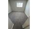Bright bedroom with neutral carpet, window, and fresh paint at 2280 S Jasper Way # A, Aurora, CO 80013