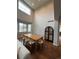Dining space features a wooden table and chairs, ideal for Gathering meals at 4970 Laurelglen Ln, Highlands Ranch, CO 80130