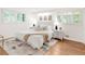 Bright bedroom with wood floors, large closets, and ample natural light at 950 Everett St, Lakewood, CO 80215