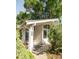 Charming front entrance with a slate tiled porch and decorative glass front door at 950 Everett St, Lakewood, CO 80215