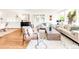 Inviting living room with comfortable seating, stylish decor, and beautiful hardwood floors at 950 Everett St, Lakewood, CO 80215