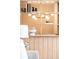 Stylish shelving with modern light fixture and plenty of room for decorations at 950 Everett St, Lakewood, CO 80215