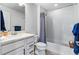 Well-lit bathroom with subway-tiled shower, modern fixtures, and a neutral color palette at 10031 Town Ridge Ln, Lone Tree, CO 80124