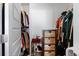 Organized closet featuring shelving, hanging storage, and decorative baskets to hold clothes and accessories at 10031 Town Ridge Ln, Lone Tree, CO 80124