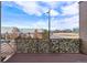 Outdoor deck view with privacy screen, overlooking a residential neighborhood at 10031 Town Ridge Ln, Lone Tree, CO 80124