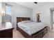 Cozy main bedroom with comfortable bed, ceiling fan, closet, and modern design at 10031 Town Ridge Ln, Lone Tree, CO 80124