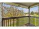 Balcony view of a grassy area and playground, framed by the balcony railing and the building at 3262 E 103Rd Dr # 1806, Thornton, CO 80229