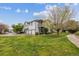 Well-maintained townhome exteriors with lush landscaping, multiple garages, and inviting curb appeal at 3262 E 103Rd Dr # 1806, Thornton, CO 80229