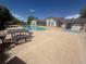 Relaxing community pool with nearby tables and chairs, perfect for summer days and recreation at 3262 E 103Rd Dr # 1806, Thornton, CO 80229