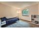 Comfortable bedroom with ample natural light, perfect for relaxation and personalization at 4858 S Queen St, Littleton, CO 80127