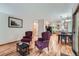 Inviting living room with hardwood floors and open floor plan, perfect for relaxing and entertaining at 4858 S Queen St, Littleton, CO 80127