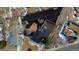 Aerial shot of a house and neighborhood featuring a well-maintained yard and lush landscaping at 1390 S Jasmine Way, Denver, CO 80224
