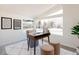 Stylish home office with modern desk, comfortable seating, and a large window with outdoor views at 1390 S Jasmine Way, Denver, CO 80224
