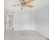Spacious bedroom with ceiling fan and neutral carpet at 9369 Longs Peak Dr, Commerce City, CO 80640
