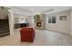 Finished basement featuring a stone fireplace, recessed lighting, stylish flooring, and built-in shelves at 8155 W Tennessee Dr, Lakewood, CO 80226