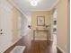 Welcoming foyer with hardwood floors, neutral walls, and elegant decor at 8155 W Tennessee Dr, Lakewood, CO 80226