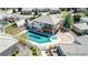 Aerial view of house, pool, and surrounding neighborhood at 13990 E Chenango Dr, Aurora, CO 80015
