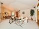 Bright living room with vaulted ceilings, modern furniture, and an open concept design at 13990 E Chenango Dr, Aurora, CO 80015