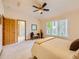 Bright main bedroom boasts vaulted ceiling, and multiple windows at 13990 E Chenango Dr, Aurora, CO 80015