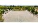 Community basketball court with multiple hoops and well-maintained surface at 3940 Malaya St, Denver, CO 80249
