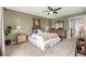 Comfortable bedroom with two bedside tables and large dresser at 3940 Malaya St, Denver, CO 80249
