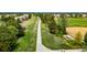 Scenic walking path with lush greenery at 3940 Malaya St, Denver, CO 80249