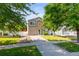 Well-maintained two-story home with a manicured lawn, driveway, and charming curb appeal at 18672 E Chaffee Pl, Denver, CO 80249