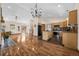 Bright, open-concept living space connecting the kitchen, living room, and dining area at 459 Virginia Ave, Palmer Lake, CO 80133