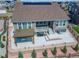 This backyard features a patio, a pergola, green space, and a well-manicured lawn at 5128 Preserve Pl, Firestone, CO 80504