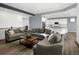 Open concept living room offering seamless access to kitchen, great for entertaining at 5128 Preserve Pl, Firestone, CO 80504