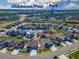 Aerial view of a neighborhood with a park, pool, and clubhouse within walking distance at 5128 Preserve Pl, Firestone, CO 80504