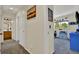Upstairs hallway leading to bedrooms and bathroom, offering a bright and open space at 165 Montgomery Dr, Erie, CO 80516