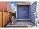 Cozy backyard seating area featuring two chairs and a stylish outdoor rug, creating an inviting and relaxing space at 5760 N Boston St, Denver, CO 80238