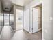 Hallway with access to bedroom, bathroom and closet space at 5760 N Boston St, Denver, CO 80238