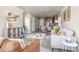 Bright, open-concept living space connected to dining and kitchen areas at 5760 N Boston St, Denver, CO 80238