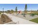 Enjoy the park with picnic tables and a slide, set in a community near single Gathering homes at 5760 N Boston St, Denver, CO 80238