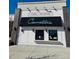 Carmella's Pizza and Ice Cream storefront featuring a sleek awning and inviting signage for a delightful local dining experience at 5760 N Boston St, Denver, CO 80238